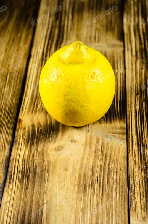 Preview: Fresh Yellow Lemon On A Wooden Table