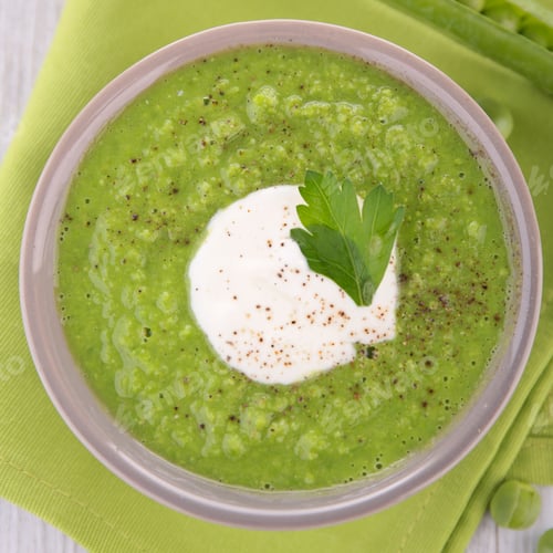 Creamy Green Pea Soup with Parsley Garnish