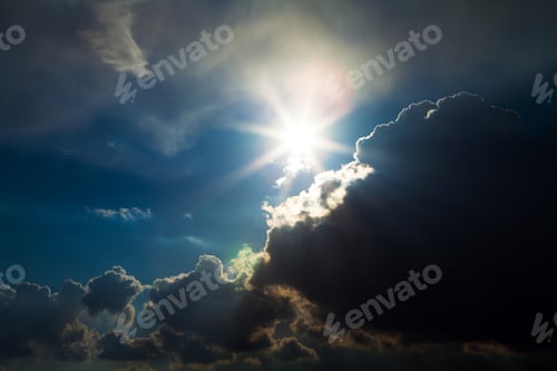 Preview: Sun Shining Through Clouds in the Sky