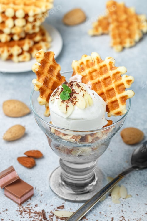 Preview: Delicious Dessert Of Belgian Waffles, Ice Cream, Almonds, Chocolate And Mint. Gourmet Appetizer