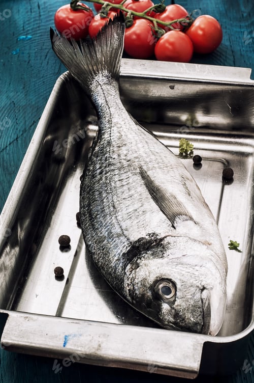 Preview: Crude Delicate Fish In Composition With Branch Tomato