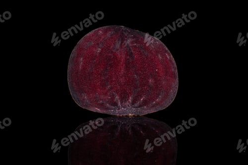 Preview: One Half Of Raw Sweet Beetroot Section Isolated On Black Glass