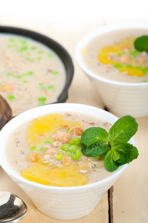 Preview: Hearty Middle Eastern Chickpea And Barley Soup With Mint Leaves On Top