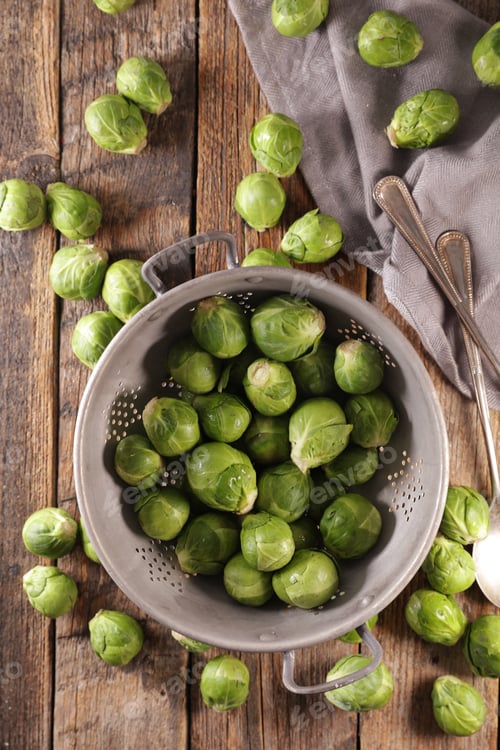 Preview: Raw Brussels Sprouts On Wood Background