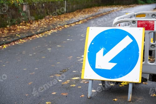 Preview: Road Sign Blue Arrow Lane Control On Rural Countryside Road