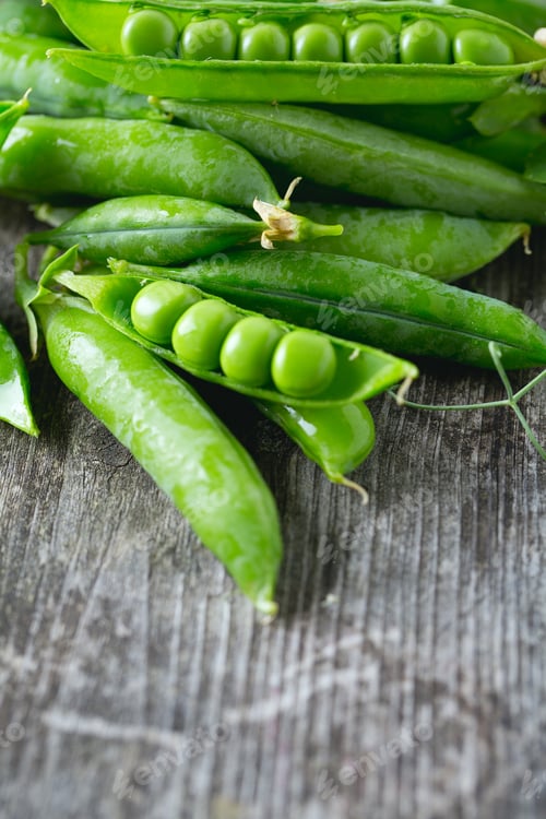 Preview: Pea Pods On Wooden Table