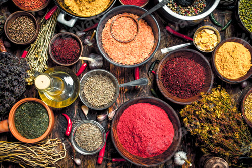 Preview: Various Fragrant Spices And Herbs. On A Wooden Background.