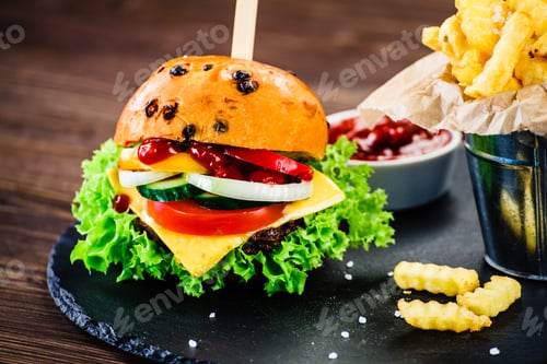 Preview: Tasty Burger With Chips Served On Cutting Board