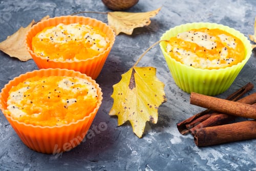 Preview: Pumpkin Muffins On A Background With Autumn Leaves