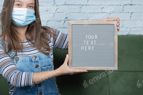 Preview: Your Text Here Poster In The Hand Of A Girl Regarding Pandemy