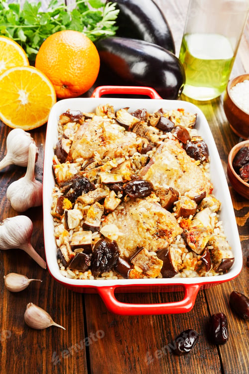 Preview: Chicken Thigh Baked With Rice, Eggplant And Figs On A Table