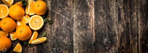 Preview: Fresh Oranges With Leaves. On A Wooden Background.