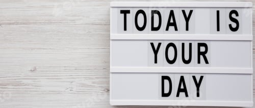 Preview: 'Today Is Your Day' On A Modern Board On A White Wooden Surface, Top View. Flat Lay, Overhead, From
