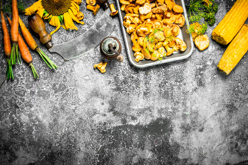 Preview: Organic Food. Fresh Mushrooms And Vegetables. On A Rustic Background.