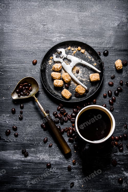Preview: Fresh Coffee. Coffee Cup With Brown Sugar And Roasted Grains . On Black Rustic Background.