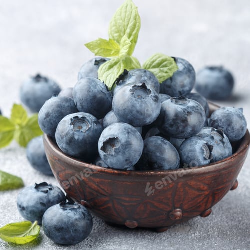 Preview: Fresh Organic Blueberries In A Clay Bowl. Juicy Berry And Mint Leaves On A Stone Or Concrete