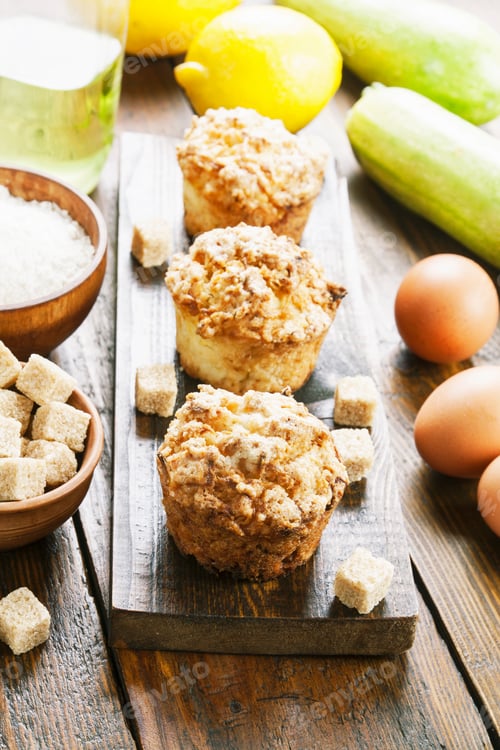 Preview: Muffins With Zucchini And Lemon On The Table