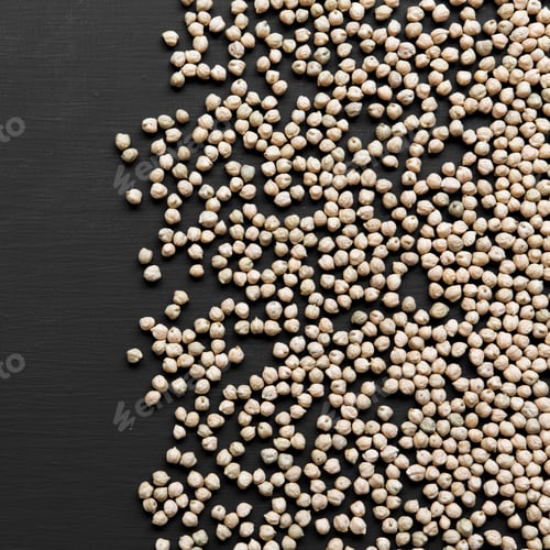 Preview: Dried Chickpeas On A Dark Black Background, Overhead View. Flat Lay, Top View, From Above.