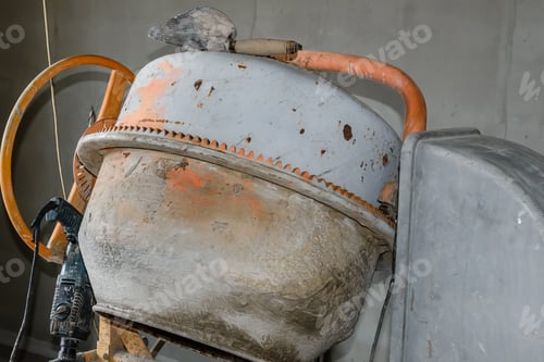 Preview: Concrete Mixer And Hammer Drill At Construction Site