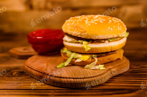 Preview: Hamburger And Sauce On Rustic Wooden Table