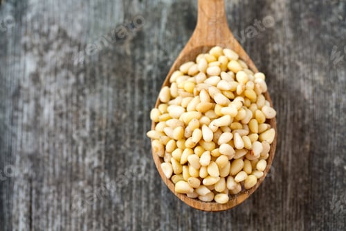 Preview: Pine Nuts In A Wooden Spoon