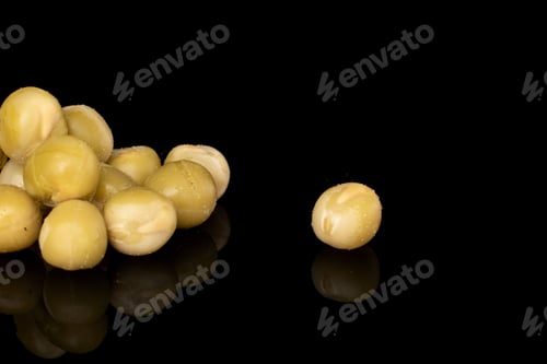 Preview: Lot Of Whole Canned Pea Isolated On Black Glass