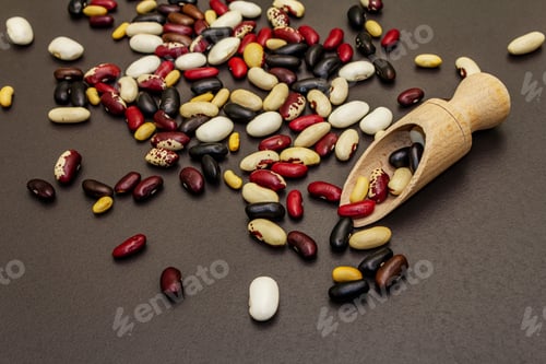 Preview: Assorted Different Types Of Beans In Wooden Scoop. Mix Of Various Dry Legumes Scattered On Black