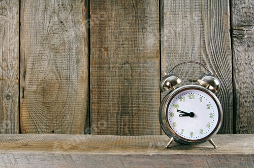 Preview: Alarm Clock. On A Wooden Background.