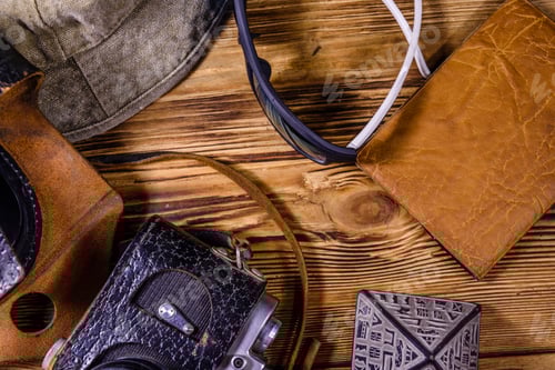 Preview: Hipster Hat, Vintage Camera, Sunglasses, Souvenir Pyramid And Passport On Wooden Background. Travel