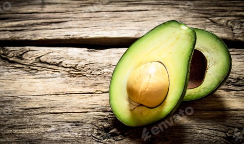 Preview: Avocado On The Wooden Table. Free Text Space