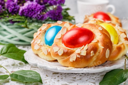 Preview: Traditional Easter Buns Decorated With Eggs, Almond Petals And Lemon Zest. Sweet Festive Bread In