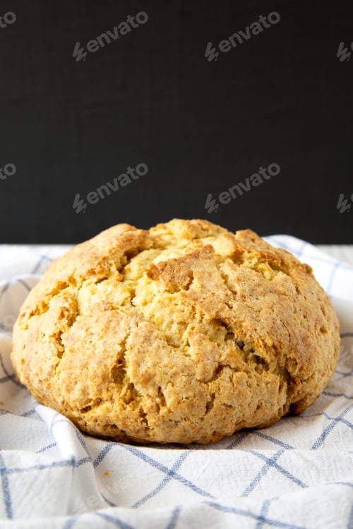 Preview: Homemade Irish Soda Bread On Cloth, Low Angle View. Close-Up.