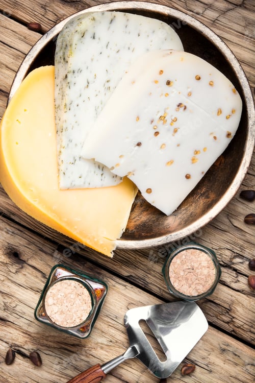 Preview: Different Types Of Cheese On Rustic Wooden Table