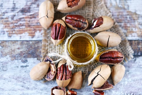 Preview: Selective Focus. Pecan Oil. Pecans Pecan Oil Production Concept. Macro.