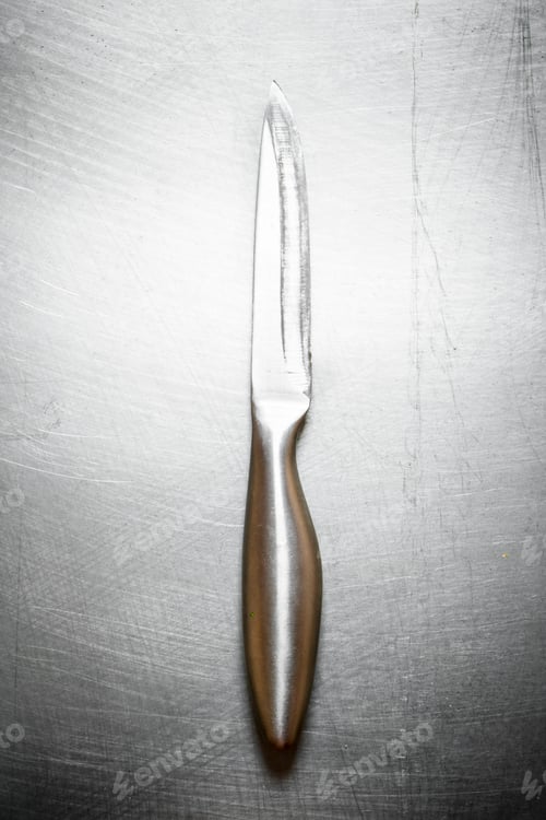 Preview: Metal Steel Knife . On The Metal Table.