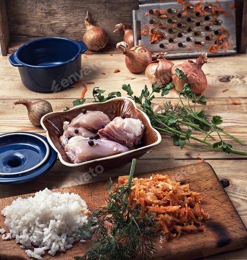 Preview: Raw Fillet Of Chicken Meat And Onions In The Process Of Cooking Food