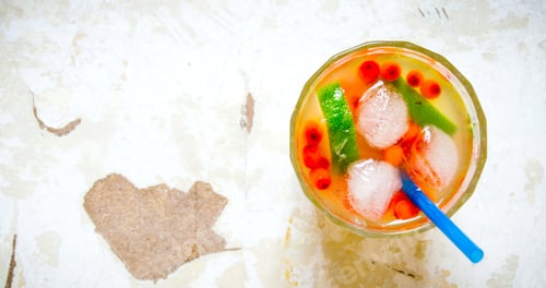 Preview: Sea Buckthorn Cocktail . Cocktail Of Sea Buckthorn Berries , Ice And Lime On The Old Table . Free