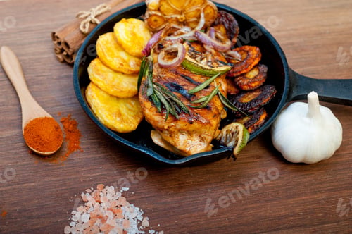 Preview: Roasted Grilled Bbq Chicken Breast With Herbs And Spices Rustic Style On Iron Skillet