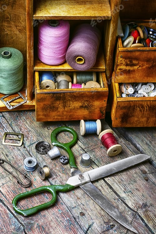 Preview: Spools Of Sewing Threads And Buttons From Clothing