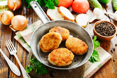 Preview: Burgers In The Pan On The Wooden Table