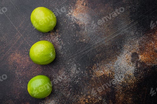 Preview: Ripe Green Lime Set, On Old Dark Rustic Background, Top View Or Flat Lay With Copy Space For Text