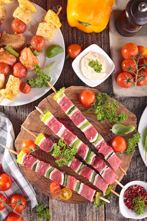 Preview: Raw Meat And Fish Skewer With Sauce