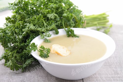 Creamy Soup with Herbs and Bread Croutons
