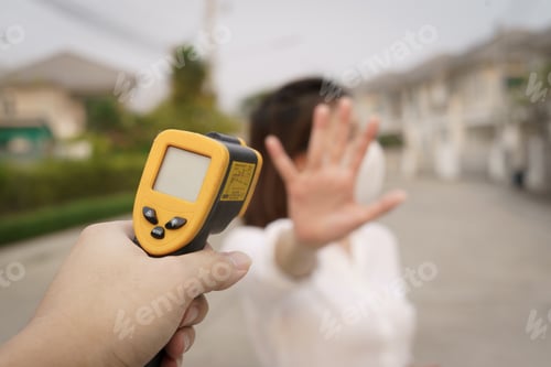 Preview: Digital Thermometer Checking Temperature. Woman