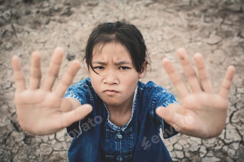 Preview: Sad Girl On Cracked Dry Ground , Concept Drought And Shortage Of Water Crisis, Selective And Soft