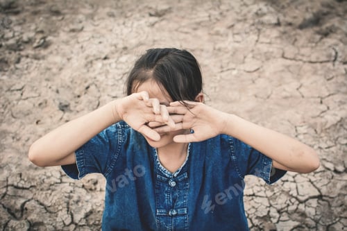 Preview: Sad Girl Praying For The Rain On Cracked Dry Ground , Concept Drought And Shortage Of Water Crisis