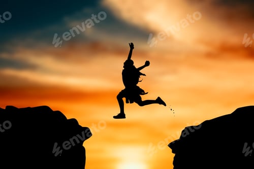 Preview: Silhouette Of Boy Jumping At Sky Sunset