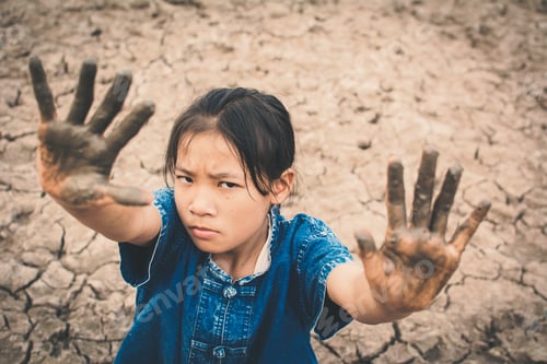 Preview: Sad Girl On Cracked Dry Ground , Concept Drought And Shortage Of Water Crisis, Selective And Soft