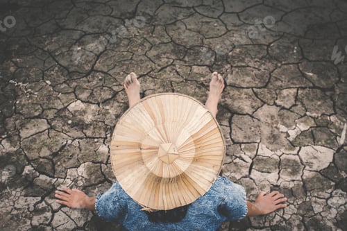 Preview: Sad Girl And Exhausted On Cracked Dry Ground, Concept Drought And Shortage Of Water Crisis