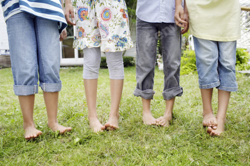 Preview: Cropped View Of Young Girls Legs Outdoors